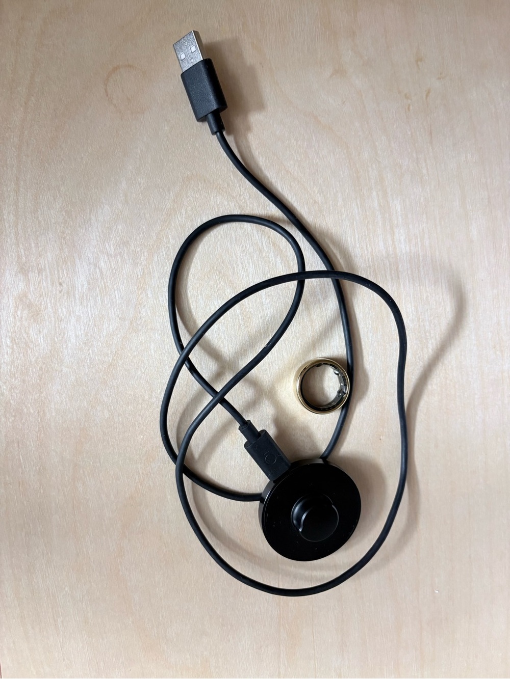 Oura Ring Charger with Gold Oura Ring